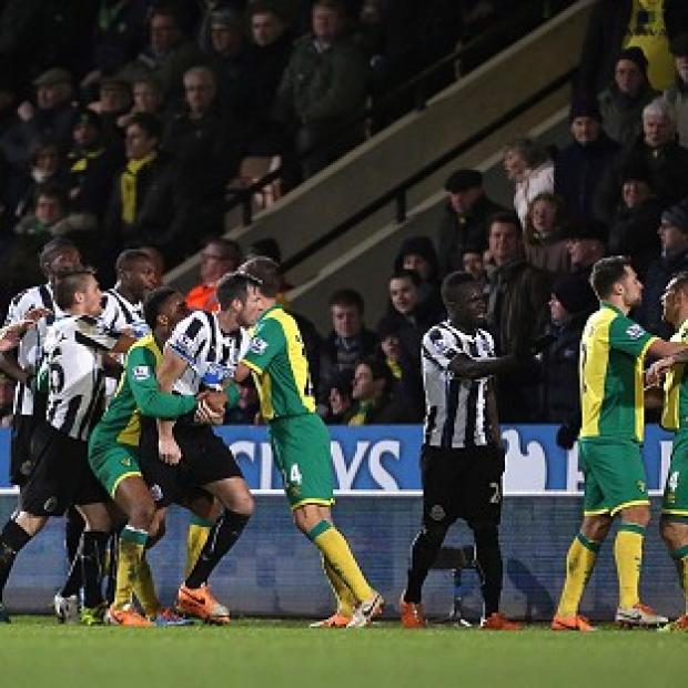 Congleton Guardian: Norwich City's Bradley Johnson, right, saw red against Newcastle Congleton Guardian: Norwich City's Bradley Johnson, right, saw red against Newcastle