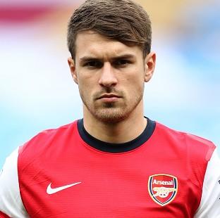 Congleton Guardian: Aaron Ramsey is struggling with a thigh problem Congleton Guardian: Aaron Ramsey is struggling with a thigh problem
