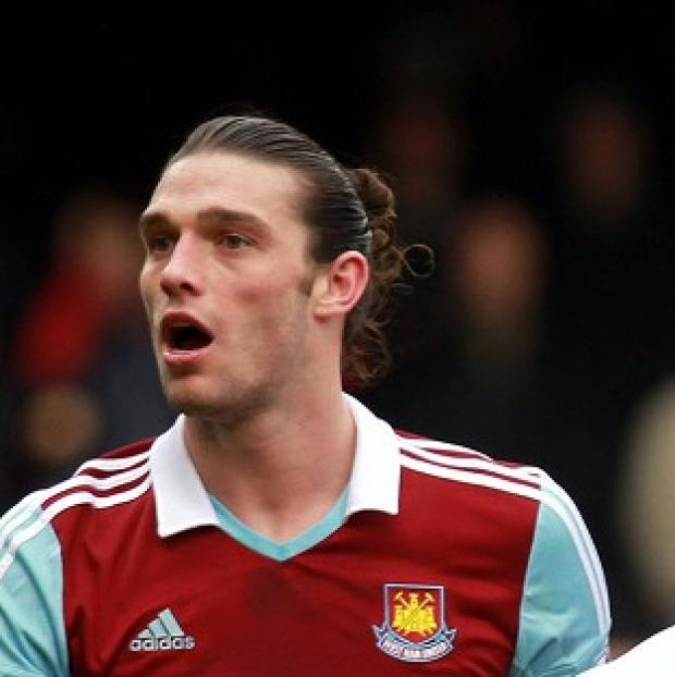 Congleton Guardian: Andy Carroll, left, was sent off against Swansea after a clash with Chico Flores Congleton Guardian: Andy Carroll, left, was sent off against Swansea after a clash with Chico Flores