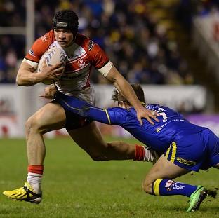 Congleton Guardian: Jonny Lomax is tackled by Warrington Wolves' Richie Myler Congleton Guardian: Jonny Lomax is tackled by Warrington Wolves' Richie Myler