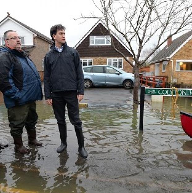 Congleton Guardian: Ed Miliband has attacked David Cameron for giving up the fight against climate change and said the winter storms should serve as a "wake-up call" Congleton Guardian: Ed Miliband has attacked David Cameron for giving up the fight against climate change and said the winter storms should serve as a "wake-up call"