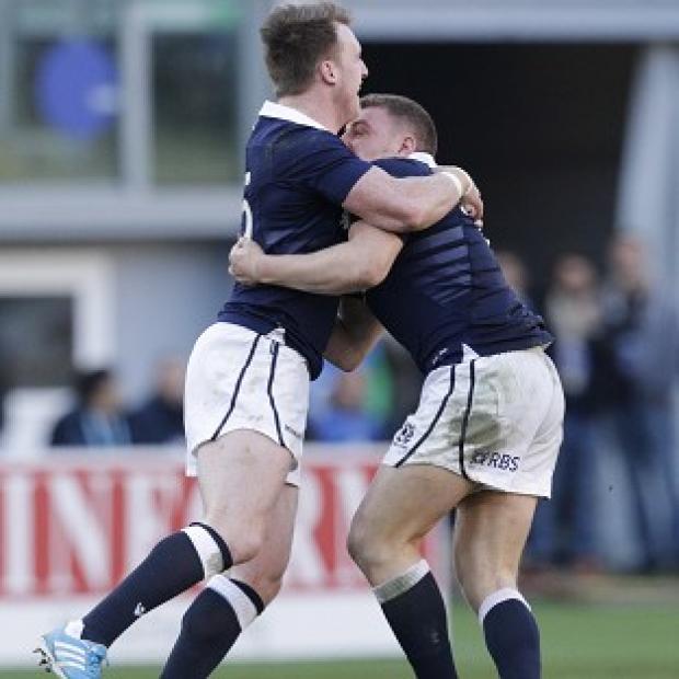 Congleton Guardian: Duncan Weir, right, and Stuart Hogg celebrate after the match-winning drop goal (AP) Congleton Guardian: Duncan Weir, right, and Stuart Hogg celebrate after the match-winning drop goal (AP)