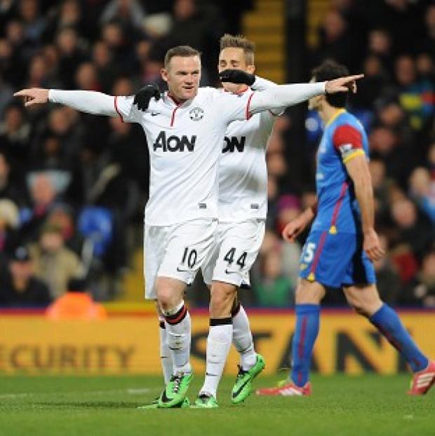 Congleton Guardian: Wayne Rooney, left, celebrates scoring Manchester United's second goal Congleton Guardian: Wayne Rooney, left, celebrates scoring Manchester United's second goal