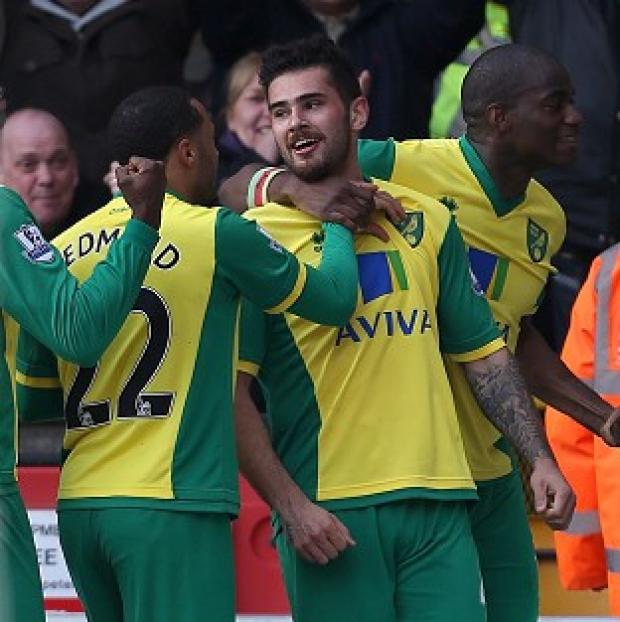 Congleton Guardian: Bradley Johnson celebrates putting Norwich ahead Congleton Guardian: Bradley Johnson celebrates putting Norwich ahead