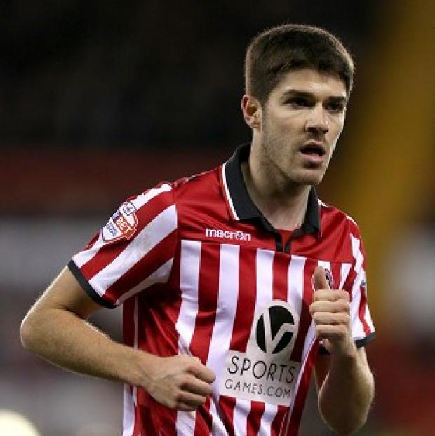 Congleton Guardian: Ryan Flynn opened the scoring in Sheffield United's memorable victory Congleton Guardian: Ryan Flynn opened the scoring in Sheffield United's memorable victory