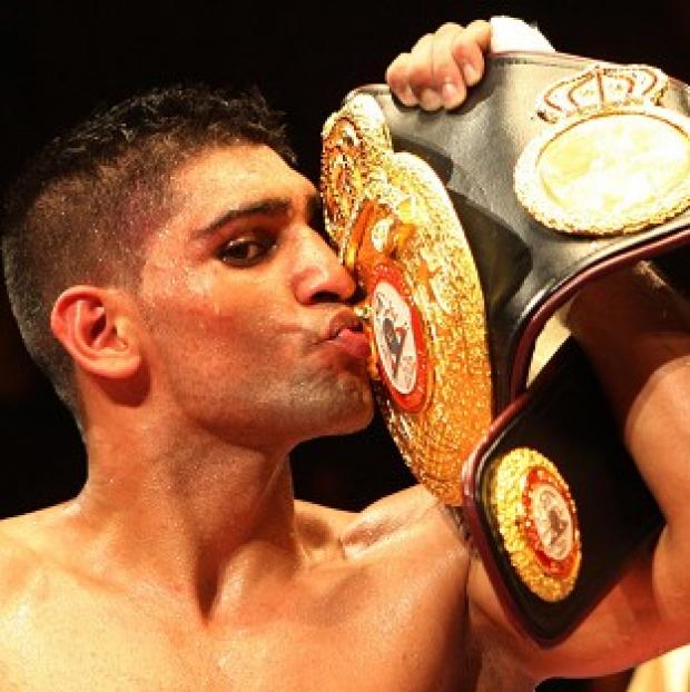 Congleton Guardian: Champion Amir Khan said he would not allow his son or daughter to become a boxer Congleton Guardian: Champion Amir Khan said he would not allow his son or daughter to become a boxer