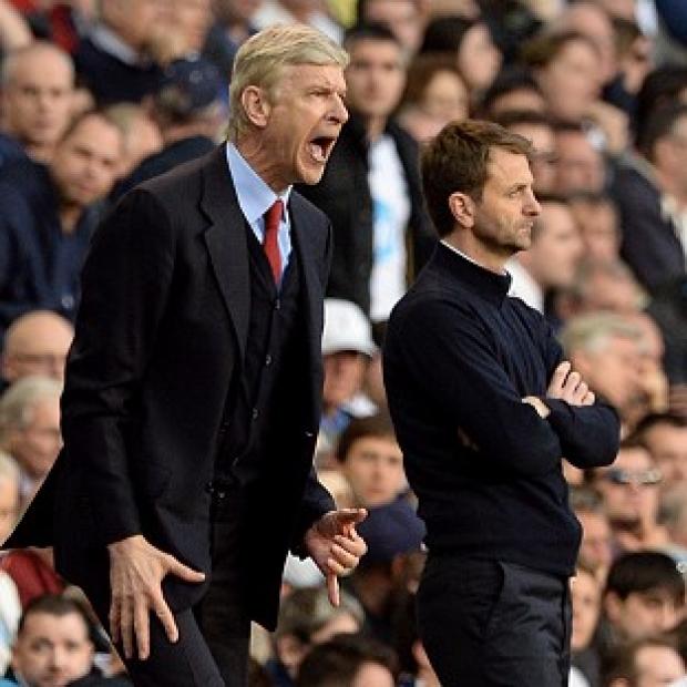 Congleton Guardian: Arsene Wenger's side kept themselves in the race for the Premier League title by winning at Tottenham on Sunday Congleton Guardian: Arsene Wenger's side kept themselves in the race for the Premier League title by winning at Tottenham on Sunday