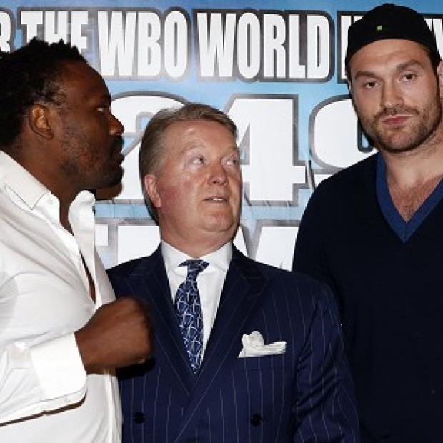 Congleton Guardian: Tyson Fury, right, will prepare to face Dereck Chisora with a fight behind closed doors Congleton Guardian: Tyson Fury, right, will prepare to face Dereck Chisora with a fight behind closed doors