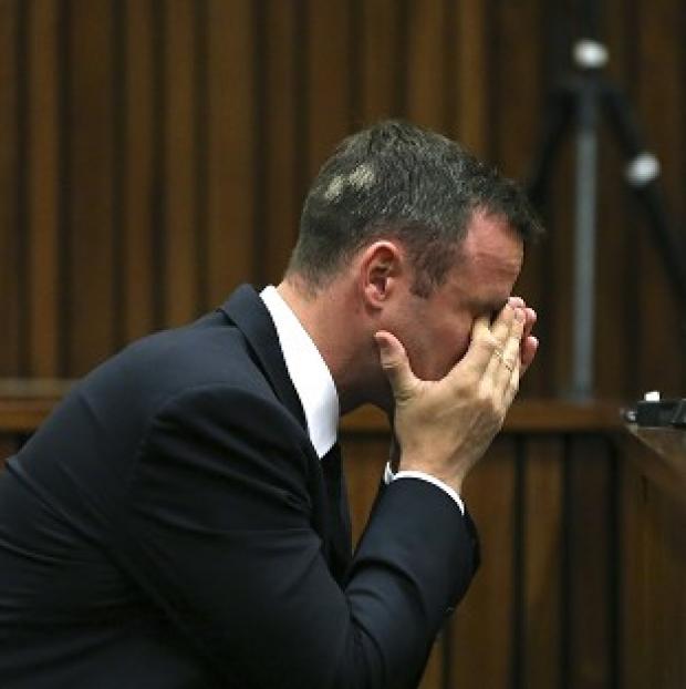Congleton Guardian: Oscar Pistorius listens to ballistic evidence being given in court in South Africa (AP) Congleton Guardian: Oscar Pistorius listens to ballistic evidence being given in court in South Africa (AP)