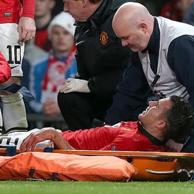 Congleton Guardian: Robin van Persie scored a hat-trick before he was stretchered off Congleton Guardian: Robin van Persie scored a hat-trick before he was stretchered off