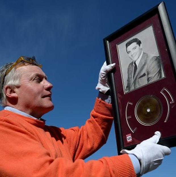 Congleton Guardian: Jim Railton holds a rare strand of Elvis Presley's hair which will be sold at auction Congleton Guardian: Jim Railton holds a rare strand of Elvis Presley's hair which will be sold at auction
