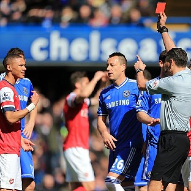 Congleton Guardian: Andre Marriner, right, mistakenly sent off Kieran Gibbs, left, during Arsenal's 6-0 defeat to Chelsea on Saturday Congleton Guardian: Andre Marriner, right, mistakenly sent off Kieran Gibbs, left, during Arsenal's 6-0 defeat to Chelsea on Saturday
