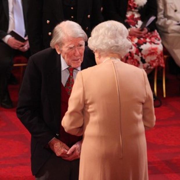 Congleton Guardian: Raymond Roberts receives his Member of the British Empire medal from the Queen during an investiture ceremony at Buckingham Palace in February last year. Congleton Guardian: Raymond Roberts receives his Member of the British Empire medal from the Queen during an investiture ceremony at Buckingham Palace in February last year.