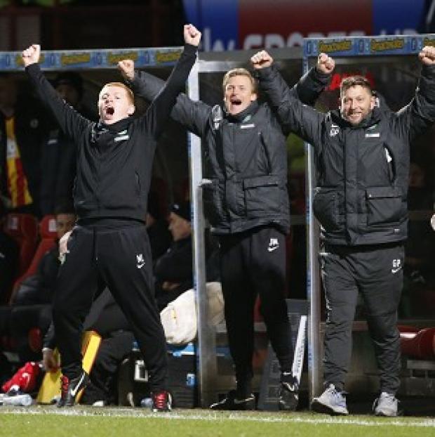 Congleton Guardian: Neil Lennon, left, celebrates as Celtic clinch the title Congleton Guardian: Neil Lennon, left, celebrates as Celtic clinch the title