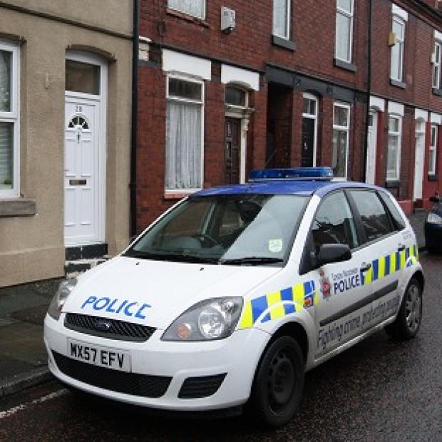 Congleton Guardian: A police car outside the home of nurse Victorino Chua in Stockport when he was previously arrested Congleton Guardian: A police car outside the home of nurse Victorino Chua in Stockport when he was previously arrested