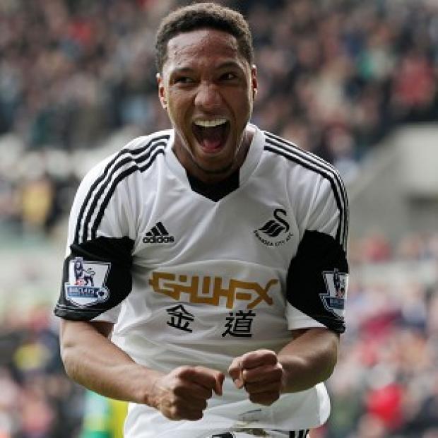 Congleton Guardian: Jonathan de Guzman celebrates scoring his second goal in a 3-0 win over Norwich Congleton Guardian: Jonathan de Guzman celebrates scoring his second goal in a 3-0 win over Norwich