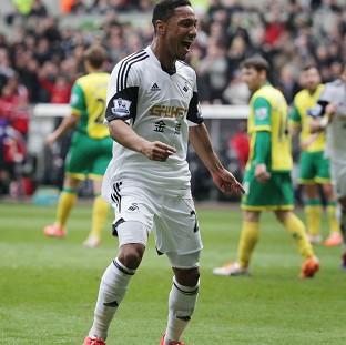 Congleton Guardian: Jonathan de Guzman netted twice in a much-needed win for Swansea Congleton Guardian: Jonathan de Guzman netted twice in a much-needed win for Swansea