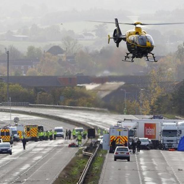 Congleton Guardian: Emergency services work at the scene on the M5 motorway close to Taunton following the pile-up Congleton Guardian: Emergency services work at the scene on the M5 motorway close to Taunton following the pile-up