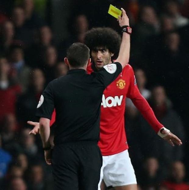 Congleton Guardian: Footage on YouTube emerged which appeared to show Marouane Fellaini, right, spitting near to Pablo Zabaleta's head Congleton Guardian: Footage on YouTube emerged which appeared to show Marouane Fellaini, right, spitting near to Pablo Zabaleta's head