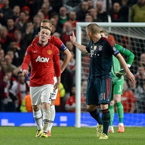 Congleton Guardian: Wayne Rooney, left, has denied that he dived Congleton Guardian: Wayne Rooney, left, has denied that he dived