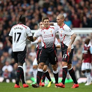 Congleton Guardian: Steven Gerrard, centre, celebrates scoring his side's first goal Congleton Guardian: Steven Gerrard, centre, celebrates scoring his side's first goal