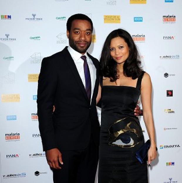 Congleton Guardian: Chiwetel Ejiofer (left) and Thandie Newton attending the premiere of Half of A Yellow Sun at the Odeon Streatham, London. Congleton Guardian: Chiwetel Ejiofer (left) and Thandie Newton attending the premiere of Half of A Yellow Sun at the Odeon Streatham, London.