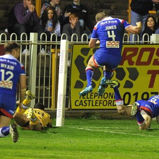 Congleton Guardian: Adam Swift's late try won the game for St Helens Congleton Guardian: Adam Swift's late try won the game for St Helens