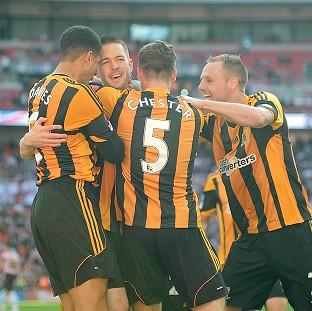 Congleton Guardian: Matty Fryatt, centre, celebrates netting Hull's second goal Congleton Guardian: Matty Fryatt, centre, celebrates netting Hull's second goal