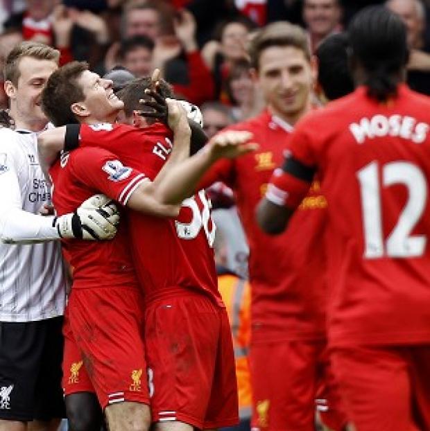 Congleton Guardian: Steven Gerrard, second left, was instrumental in Liverpool's win Congleton Guardian: Steven Gerrard, second left, was instrumental in Liverpool's win