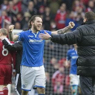 Congleton Guardian: Stevie May, left, celebrates with manager Tommy Wright after the final whistle Congleton Guardian: Stevie May, left, celebrates with manager Tommy Wright after the final whistle