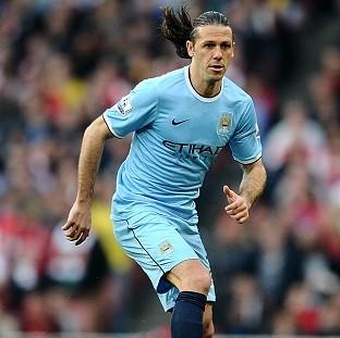 Congleton Guardian: Manchester City defender Martin Demichelis insists title race is not over Congleton Guardian: Manchester City defender Martin Demichelis insists title race is not over