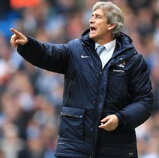 Congleton Guardian: Manuel Pellegrini refuses to be downcast following Sunday's defeat to Liverpool Congleton Guardian: Manuel Pellegrini refuses to be downcast following Sunday's defeat to Liverpool