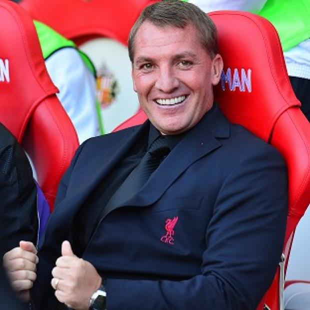 Congleton Guardian: Liverpool boss Brendan Rodgers is loving life at the top of the league Congleton Guardian: Liverpool boss Brendan Rodgers is loving life at the top of the league