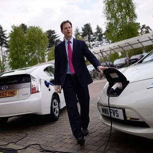 Congleton Guardian: Deputy Prime Minister Nick Clegg charges an electric car during a visit to the Transport Research Laboratory in Berkshire Congleton Guardian: Deputy Prime Minister Nick Clegg charges an electric car during a visit to the Transport Research Laboratory in Berkshire