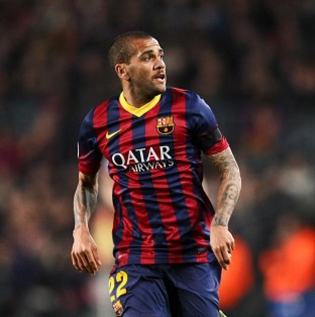 Congleton Guardian: Dani Alves has been praised by several footballers after he ate a banana thrown at him during Barcelona's match at Villarreal Congleton Guardian: Dani Alves has been praised by several footballers after he ate a banana thrown at him during Barcelona's match at Villarreal