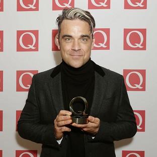 Congleton Guardian: Robbie Williams won't feature on Take That's latest album and may only pop up as a guest on the band's tour Congleton Guardian: Robbie Williams won't feature on Take That's latest album and may only pop up as a guest on the band's tour