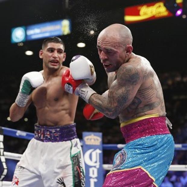 Congleton Guardian: Amir Khan, left, believes he has what it takes to beat Floyd Mayweather after Luis Collazo, right, proved no obstacle Congleton Guardian: Amir Khan, left, believes he has what it takes to beat Floyd Mayweather after Luis Collazo, right, proved no obstacle