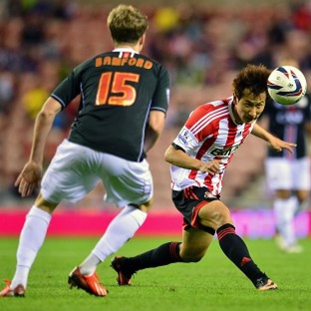 Congleton Guardian: Sunderland are unlikely to face further action for fielding Ji Dong-won, right, with incomplete registration Congleton Guardian: Sunderland are unlikely to face further action for fielding Ji Dong-won, right, with incomplete registration