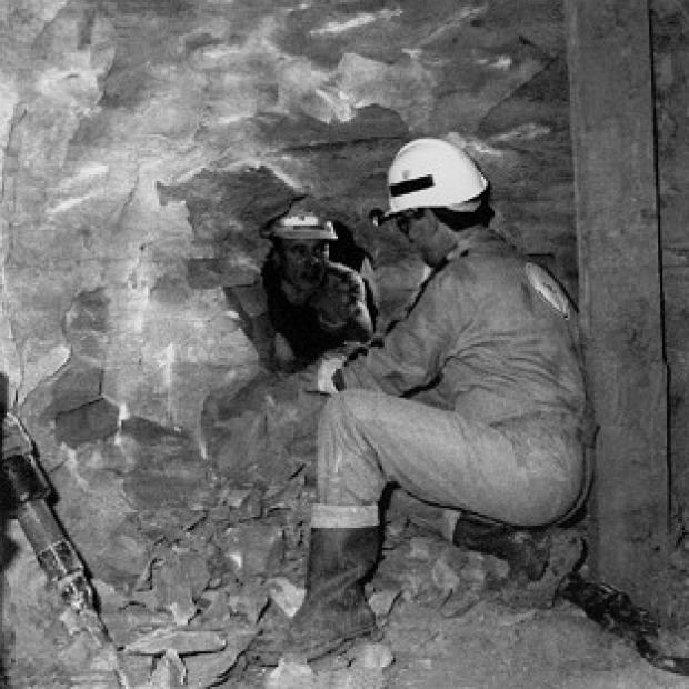 Congleton Guardian: Construction workers drill through the final wall of rock to join the two halves of the Channel Tunnel to link Britain to France Congleton Guardian: Construction workers drill through the final wall of rock to join the two halves of the Channel Tunnel to link Britain to France