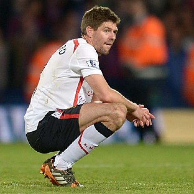 Congleton Guardian: Liverpool's Steven Gerrard was left dejected at full-time Congleton Guardian: Liverpool's Steven Gerrard was left dejected at full-time