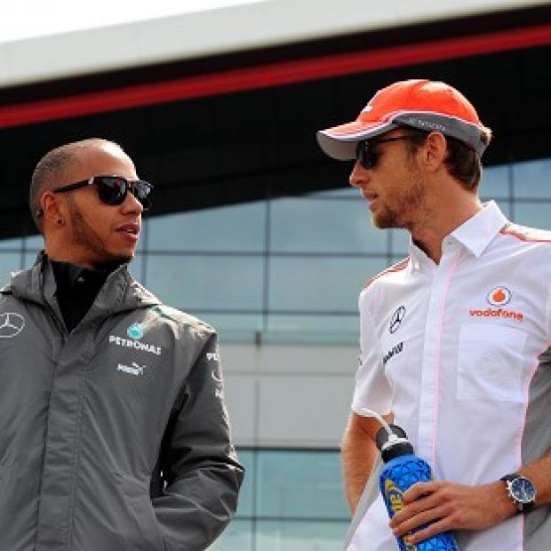 Congleton Guardian: Lewis Hamilton, left, and Jenson Button are team-mates Congleton Guardian: Lewis Hamilton, left, and Jenson Button are team-mates