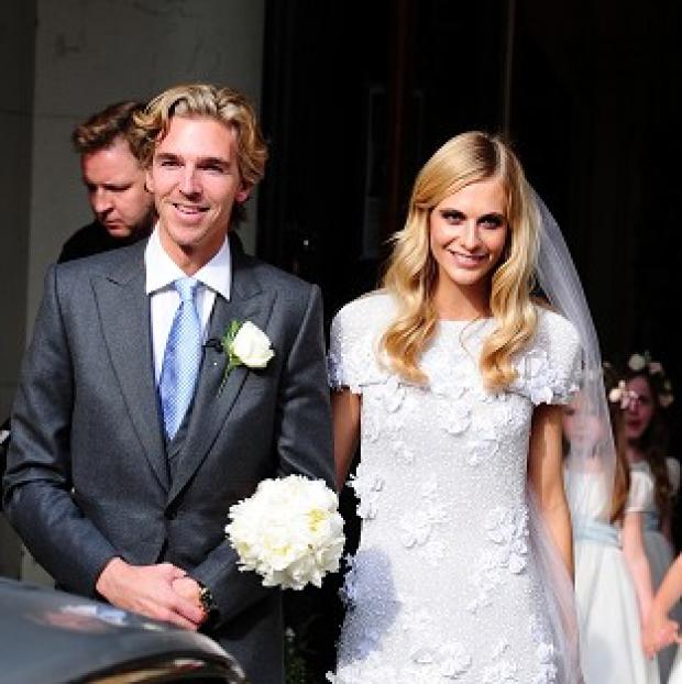 Congleton Guardian: James Cook and Poppy Delevingne after their wedding at St Paul's Church in Kensington Congleton Guardian: James Cook and Poppy Delevingne after their wedding at St Paul's Church in Kensington