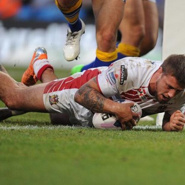 Congleton Guardian: Michael McIlorum goes over for Wigan's winning try Congleton Guardian: Michael McIlorum goes over for Wigan's winning try