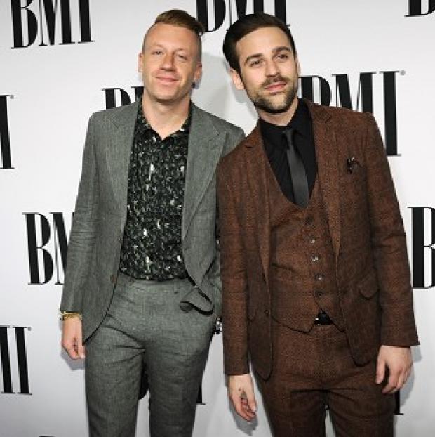 Congleton Guardian: Macklemore (left) apologised for any fuss caused by his costume at a recent gig Congleton Guardian: Macklemore (left) apologised for any fuss caused by his costume at a recent gig