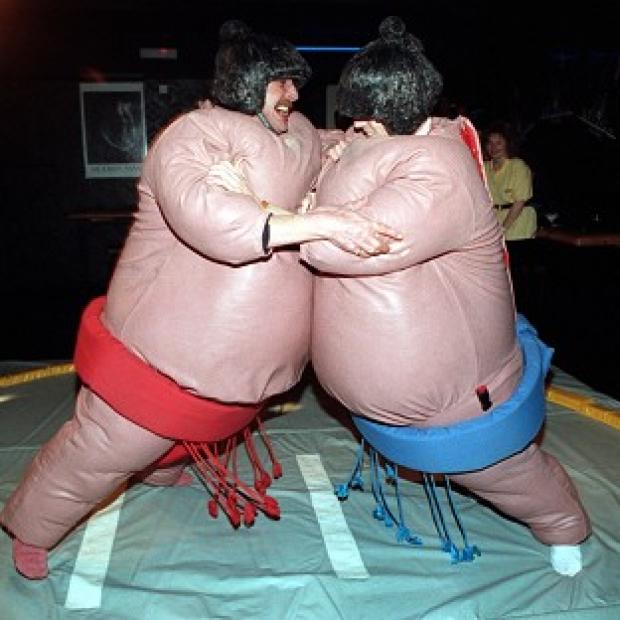 Congleton Guardian: A man knocked himself out when he bounced off a work colleague while wearing an inflatable sumo suit Congleton Guardian: A man knocked himself out when he bounced off a work colleague while wearing an inflatable sumo suit