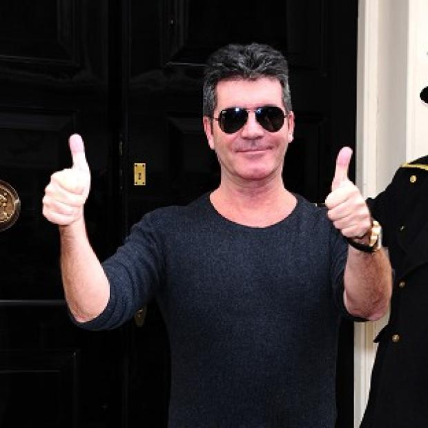 Congleton Guardian: Simon Cowell could be named Celebrity Dad of the Year Congleton Guardian: Simon Cowell could be named Celebrity Dad of the Year