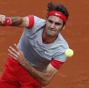 Congleton Guardian: Roger Federer eased through in 84 minutes (AP) Congleton Guardian: Roger Federer eased through in 84 minutes (AP)