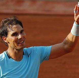 Congleton Guardian: Rafael Nadal dropped just three games against Robby Ginepri in the first round of the French Open (AP) Congleton Guardian: Rafael Nadal dropped just three games against Robby Ginepri in the first round of the French Open (AP)