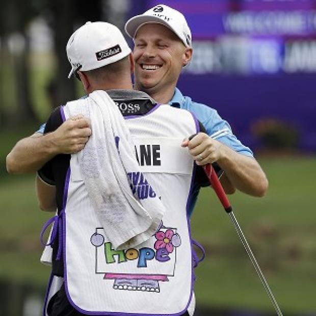 Congleton Guardian: Ben Crane hugs his caddie after winning the St Jude Classic in Memphis (AP) Congleton Guardian: Ben Crane hugs his caddie after winning the St Jude Classic in Memphis (AP)