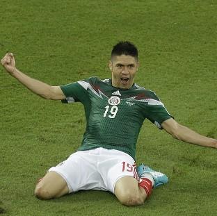 Congleton Guardian: Oribe Peralta netted the winner for Mexico (AP) Congleton Guardian: Oribe Peralta netted the winner for Mexico (AP)